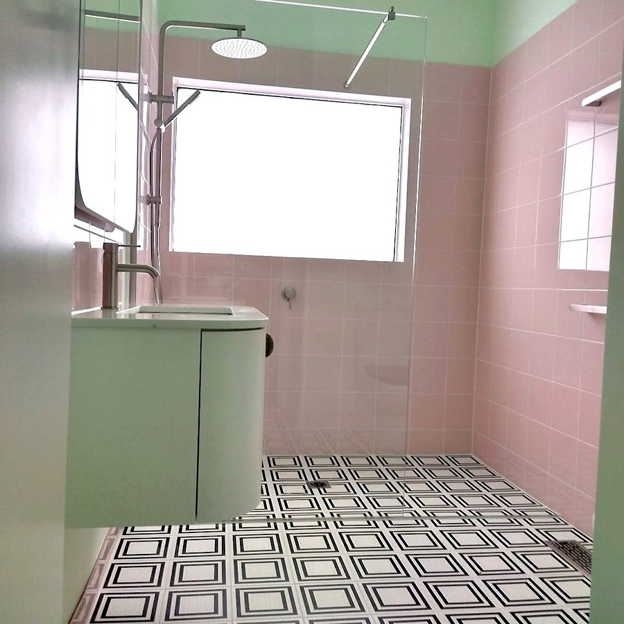Bathroom renovation with retro pink and mint tile