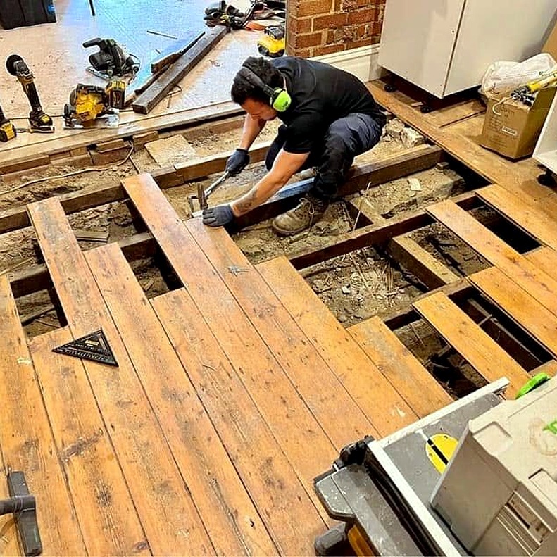 Flow Renovations mid-renovation, replacing subfloor timbers